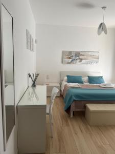A bed or beds in a room at B&B Pan del Cucco