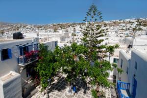 Nespecifikovaný výhled na destinaci Mykonos nebo výhled na město při pohledu z penzionu