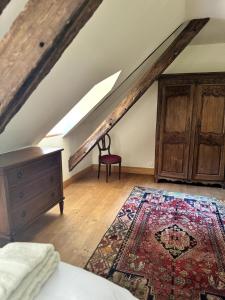 Postel nebo postele na pokoji v ubytování A l'ombre du château, Dépendance de caractère