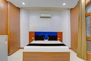 Postel nebo postele na pokoji v ubytování Hotel O Laresa