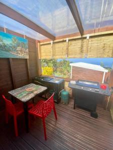 Fotografie z fotogalerie ubytování L'escapade créole bungalow vanille jacuzzi sans vis à vis privatif v destinaci Saint-Joseph