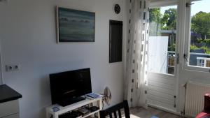 Μια τηλεόραση ή/και κέντρο ψυχαγωγίας στο Homestay Bij Aelita