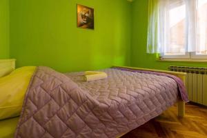 Posteľ alebo postele v izbe v ubytovaní Two-Bedroom Apartment in Crikvenica XI