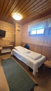 Postel nebo postele na pokoji v ubytování Lumi Guest House