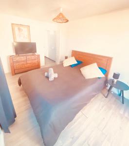 Postel nebo postele na pokoji v ubytování L'escapade créole bungalow vanille jacuzzi sans vis à vis privatif