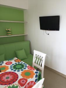 TV a/nebo společenská místnost v ubytování Corallo Home