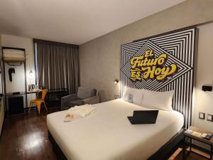 Postel nebo postele na pokoji v ubytování ibis styles Lima San Isidro