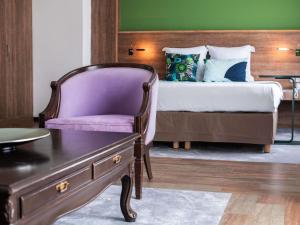 Ibis Styles Cayenne Centre Amazonia客房内的一张或多张床位