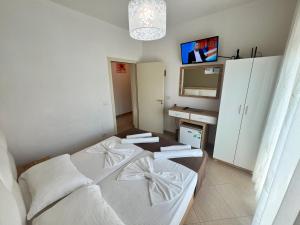 Katil atau katil-katil dalam bilik di Brian Hotel