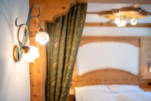 Posteľ alebo postele v izbe v ubytovaní Hotel Laurin