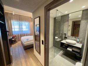 A bathroom at Hafnerhotel - Das Kachelofen-Wohlfühlhotel