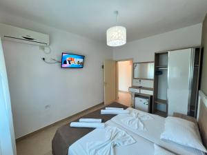 Katil atau katil-katil dalam bilik di Brian Hotel