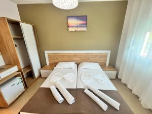 Katil atau katil-katil dalam bilik di Brian Hotel