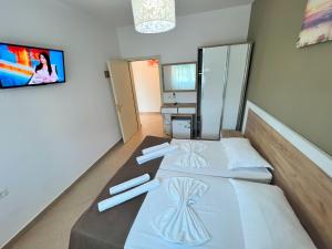 Katil atau katil-katil dalam bilik di Brian Hotel