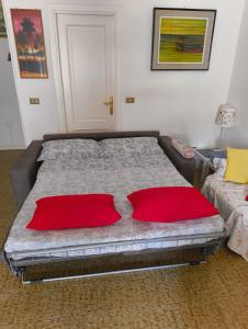 Ένα ή περισσότερα κρεβάτια σε δωμάτιο στο Casa Dolce Mare - trilocale familiare a 50m dal mare +22 φωτογραφίες