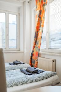 Rustikales Apartment in Mödling客房内的一张或多张床位