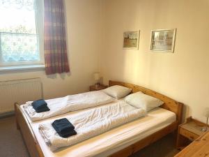 Rustikales Apartment in Mödling客房内的一张或多张床位