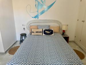 Postel nebo postele na pokoji v ubytování El Rinconcito - apartamento palacete rehabilitado