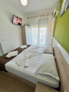 Katil atau katil-katil dalam bilik di Brian Hotel