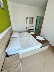 Katil atau katil-katil dalam bilik di Brian Hotel