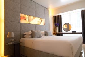 Vuode tai vuoteita majoituspaikassa Brasil Suites Boutique Hotel 37 kuvaa lisää