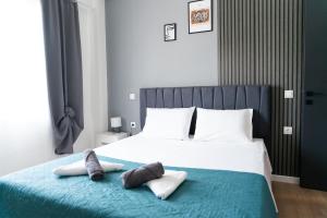 Rúm í herbergi á Seaside Casa