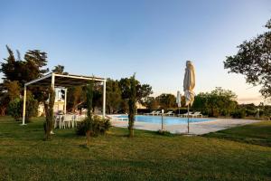 The swimming pool at or close to Villa Topazio