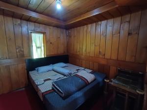 Krevet ili kreveti u jedinici u objektu Agrowisata Kopeng Gunungsari