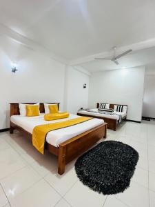 Postel nebo postele na pokoji v ubytování Sohili 3R Resort Ella