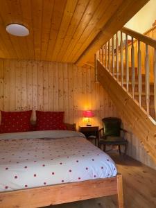 Postel nebo postele na pokoji v ubytování La Chambre Du Bisse