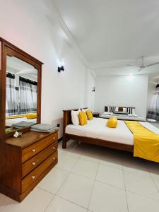 Postel nebo postele na pokoji v ubytování Sohili 3R Resort Ella