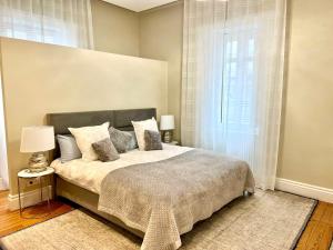 Posteľ alebo postele v izbe v ubytovaní Appartement de standing Biarritz