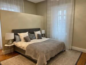 Posteľ alebo postele v izbe v ubytovaní Appartement de standing Biarritz