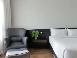 Cama ou camas em um quarto em Mercure Belo Horizonte Lourdes