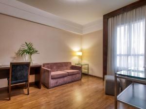 Uma área de estar em Mercure Belo Horizonte Lourdes