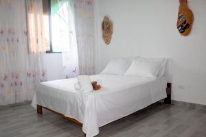 Hotel Arena Azul客房内的一张或多张床位