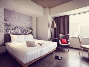 Voodi või voodid majutusasutuse Mercure Jakarta Simatupang toas
