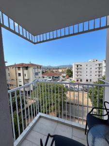 a balcony with a view of a city at Apartman D11 in Ljubuški