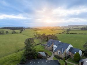 an aerial view of a house in a field at Beech Meadow-Home from Home Luxury Holiday Cottage in Kirkby Lonsdale
