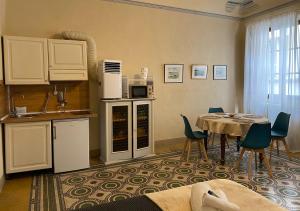 Kuchyň nebo kuchyňský kout v ubytování Albergo Diffuso Volterra