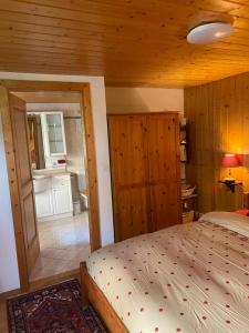Postel nebo postele na pokoji v ubytování La Chambre Du Bisse
