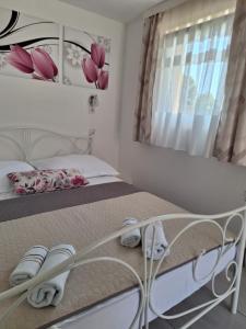 Posteľ alebo postele v izbe v ubytovaní Apartments Kozjan