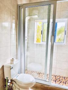Bagno di Coconut Pointe Villa & Beach Resort