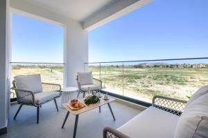 Balkón nebo terasa v ubytování Artemis 105 - Seaside Stories
