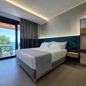 Voodi või voodid majutusasutuse Sunset Boulevard Hotel toas
