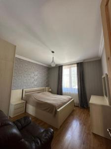 Voodi või voodid majutusasutuse zeiko s guesthouse toas
