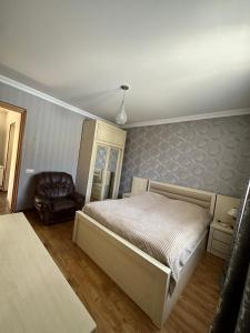 Voodi või voodid majutusasutuse zeiko s guesthouse toas