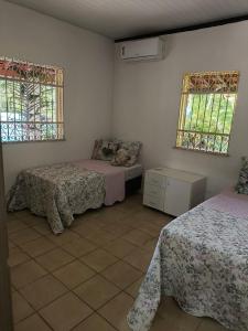 Ένα ή περισσότερα κρεβάτια σε δωμάτιο στο Fazenda Riachão
