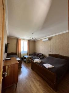 Televiisor ja/või meelelahutuskeskus majutusasutuses zeiko s guesthouse