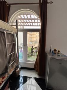 Krevet ili kreveti u jedinici u okviru objekta Dar Shaden hostel